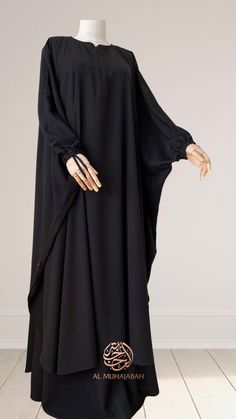 Elegant 2-piece abaya  Butterfly 2 piece abaya which provides good coverage, skirt in light good quality wool Peach fabric. This abaya has sleeves with elastic and finger loop, neck with 20 cm zip, there are slits on the sides of the abaya. With skirt with pockets and elastic waistband. Lenght of abaya 125 cm front and 135 cm at back. Width from sleeve to other sleeve total 155 cm, 170cm or 190cm. Skirt lenght 105 cm  Colour: Black Modest Solid Color Floor-length Abaya, Modest Floor-length Abaya, Formal Floor-length Dabka Abaya, Formal Long Abaya With Dabka, Long Modest Abaya With Dabka, Formal Long Abaya, Long Khimar With Dabka Detailing, Formal Modest Thobe, Modest Long Thobe For Formal Occasions