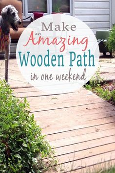 a dog standing on top of a wooden walkway next to bushes and flowers with the words make amazing wooden path in one weekend