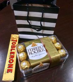 a bag and some chocolates on a table