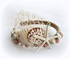 Artisan Handmade real sea shells bridal tiara, Nautical Headpiece, seashell hair accessories, beach bride. This crown of sea shells is perfect for a beach wedding or a mermaid costume Halloween or mermaid party.  I love custom orders. I will gladly make any matching earrings, necklaces, rings, bracelets, etc. to your preference. Just contact me via converstions. DELIVERY TIME (EXCLUDING PRODUCTION TIME) - UNITED STATES AND CANADA: 8-10 DAYS FOR EUROPE: 6-7 DAYS / please note that during holidays Seashell Veil, Seashell Hair Accessories, Starfish Headpiece, Beach Wedding Headpieces, Seashell Tiara, Story References, Mermaid Headpiece, Mermaid Hair Accessories, Seashell Hair