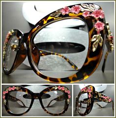 BRAND:  SPEXX Eyewear CONDITION:  Brand New with Tags FRAME COLOR:  Tortoise Frame with Gold & Pink Floral Design LENS COLOR:  Clear with No Magnification PROTECTION:  UV-400 (100% UV PROTECTION) TYPE:  Fashion Eyeglasses STYLE:  Vintage / Retro FEATURES:  Oversized Vintage Frame Design with a Retro Look.  Make a Bold Fashion Statement with these Awesome Glasses! GENDER:  Women's MEASUREMENTS:  54-18-140 SIZE:  Large FRAME MEASUREMENTS (Approximate) Width 5.75 Inches Height 2.5 Inches  YOUR PURC Vintage Frame Design, Smart Glasses