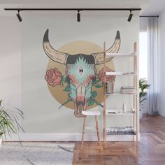 an animal skull with horns and roses on it wall mural