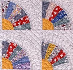 the quilt has four different designs on it