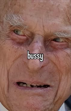 an old man with the words bussy on his face