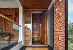 an entry way leading to a wooden staircase