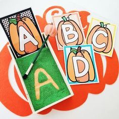 an orange pumpkin themed letter matching activity for toddlers to practice their abc and d letters