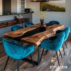 a dining room table with blue chairs around it