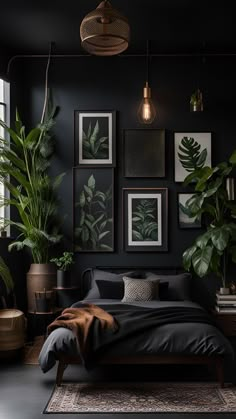 a bedroom with black walls, plants and pictures on the wall