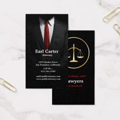 two business cards with an image of the scales of justice on them