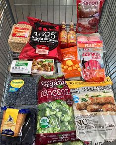 a shopping cart filled with lots of food