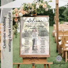 an outdoor wedding ceremony sign with flowers and greenery