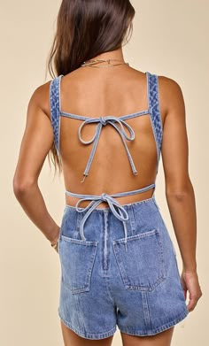 Open back jean romper ties in the back to adjust  100% cotton   model is 5"2 and wearing a size small Jean Romper, Stitching Details, April May, Denim Romper, Gameday Outfit, Denim Details, Denim Jumpsuit, Denim Fabric, Concert Outfit