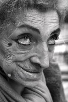 an old woman with wrinkles on her face