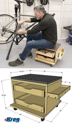 a man sitting on top of a wooden table next to a bike and some shelves