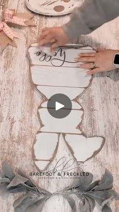 someone is making a paper cutout to look like a teddy bear