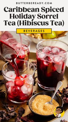 two glasses filled with tea and cherries on top of a tray next to other drinks