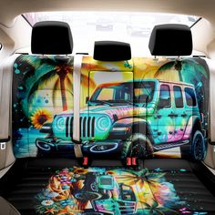 the interior of a car with an image of a jeep and palm trees on it