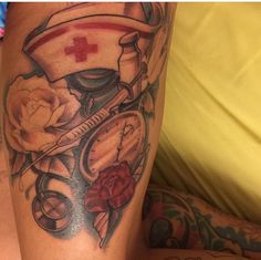 a man with a tattoo on his leg has a clock and roses