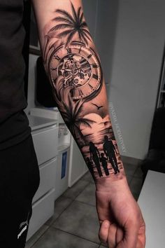 a man's arm with a clock and palm trees on it