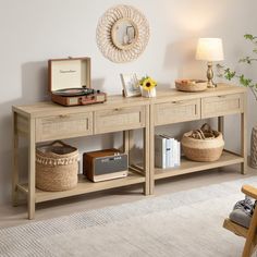 a table with two drawers and baskets on it