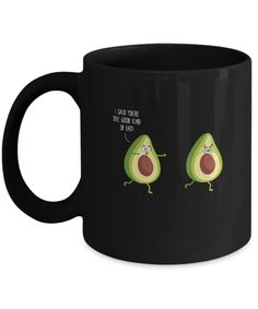 two black coffee mugs with an avocado on them