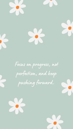 flowers with the words focus on progress, not perpetion, and keep pushing forward