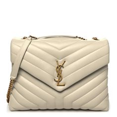 This is an authentic SAINT LAURENT Calfskin Y Quilted Monogram Medium Loulou Chain Satchel in Creama Soft. This elegant shoulder tote features chic chevron quilted calfskin leather in cream. The bag has a gold chain link shoulder straps with matching leather shoulder pads. The frontal flap features a prominent gold YSL monogram detail and opens to a partitioned black fabric interior with a pocket. Jeans For Petite Women, Chevron Quilt, Best Jeans, Petite Women, Shoulder Tote, Business Fashion, Black Fabric, Ysl Bag, Shoulder Pads