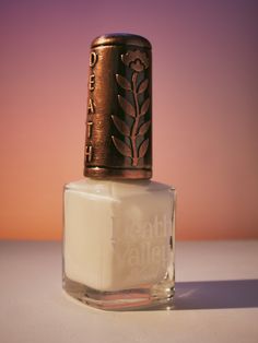 Crelly ivory white with subtle platinum shimmer 10-free. Vegan. Cruelty-free. Nontoxic. We suggest using a base coat and 2-3 coats of polish followed by a top coat. This polish comes with a removable handmade decorative bronze cap atop our standard black matte nail polish cap - merging artistry with function. To forego bronze caps on your order click here. Swatches by @oflifeandlacquer and @tectonicnailplates. Ivory Nail Polish, Dnd Velvet Cream Nail Polish, Vanilla Nail Polish, Cream Nail Polish, 1930s Nail Polish, Matte Nail Polish, Matte Black Nails, Chewy Candy, Hippie Nails