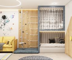 a room with a bed, couch and climbing wall