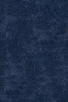 a dark blue textured wallpaper background