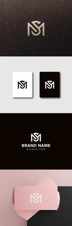 some business cards with the letter m on them