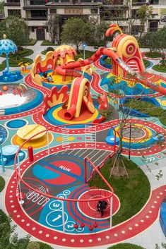 an aerial view of a colorful playground area