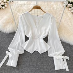 Simple v neck long sleeve tops fashion topsFabric: blendedColor: whiteSize(cm): S, M, L, XL (1inch=2.54cm)S length 53cm bust 86cm waist 66cmM length 54cm bust 90cm waist 70cmL length 55cm bust 94cm waist 74cm&ltp&gtXL length 56cm bust 98cm waist 78cm&lt/p&gt&ltbr/&gt&ltp&gtPlease check the size carefully when you choose items.&lt/p&gt&ltbr/&gt&ltp&gtFor more pictures of the dress, please contact us, thank you.&lt/p&gt&ltbr/&gt Elegant Fitted V-neck Long Sleeve Top, Elegant White Solid Color Blouse, White V-neck Long Sleeve Top For Fall, White Solid Color Top For Party, Elegant Solid Color V-neck Tops, Trendy Long Sleeve V-neck Top For Summer, Solid Color V-neck Blouse For Party, Elegant V-neck Solid Color Blouse, White Blouse For Fall