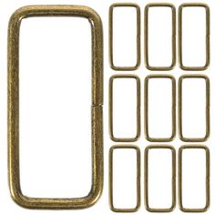 a set of metal buckles with holes on each side