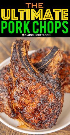 grilled pork chops on a white plate with text overlay that reads the ultimate pork chops