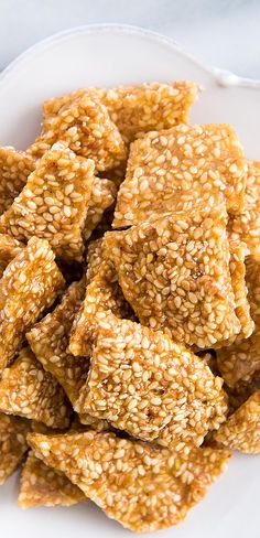 sesame seed crackers on a white plate