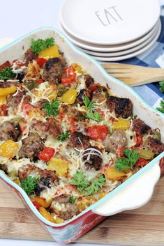 a casserole dish filled with meat and vegetables