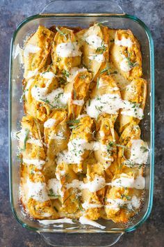 pumpkin stuffed shells in a casserole dish with text overlay