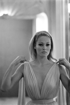 black and white photograph of woman in evening dress