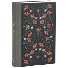 a black book with red and white flowers on the front, and green leaves on the back