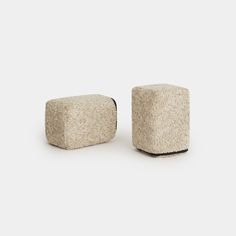 two small stools sitting next to each other