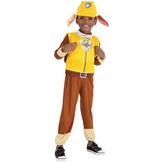 a boy in a costume that is wearing a yellow shirt and brown pants with ears