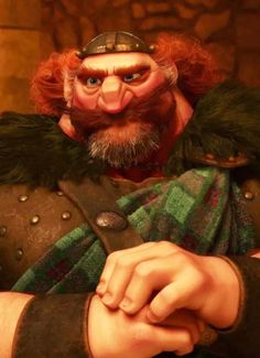 a close up of a cartoon character with red hair and beard wearing a green coat