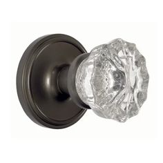 an antique style door handle with crystal glass knob