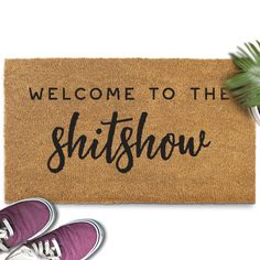 a welcome mat that says, welcome to the shitshow