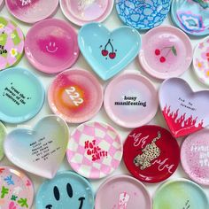 colourful pastel decor trinket dishes with positive quotes, phrases and lyrics painted on Aesthetic Coasters Painted, Clay Dishes Aesthetic, Pottery Painting Ash Tray, Clay Crafts Coasters, Tray Painting Ideas Aesthetic, Ceramic Painting Trinket Dish, Preppy Clay Trays, Cute Coasters Clay, Cute Trinket Tray