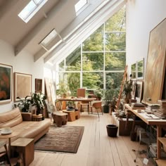 a living room filled with furniture and lots of windows in the roof space above it