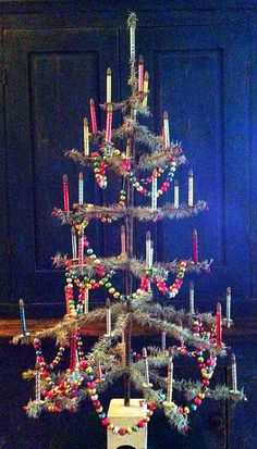 a small christmas tree sitting on top of a table