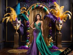 a woman in a green and purple dress standing next to two masks with feathers on them