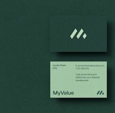 the business card is designed to look like it's made out of green paper